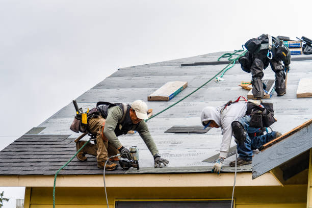 Professional Gutter Installation technician working in Manson, NC